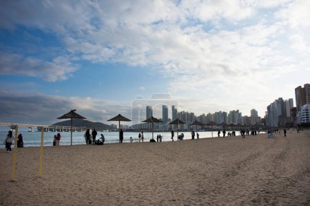 Photo for View landscape and sea ocean for korean people and foreign travelers travel visit and rest relax at Gwangalli and Gwangan sand beach park at Suyeong gu city on February 18, 2023 in Busan, South Korea - Royalty Free Image