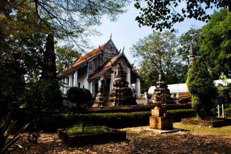 Ancient old ordination hall or antique ruin ubosot for thai travelers people travel visit respect praying blessing buddha wish myth holy worship at Wat Nang Kui Monastery Temple in Ayutthaya, Thailand