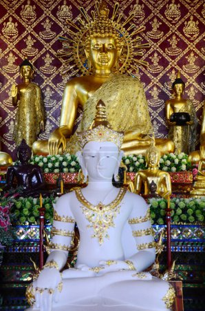 Ancient buddha in antique ubosot of Wat Phra Singh or Phra Sing temple for thai people traveler visit respect praying blessing wish myth holy mystical worship at Chiangrai city in Chiang Rai, Thailand