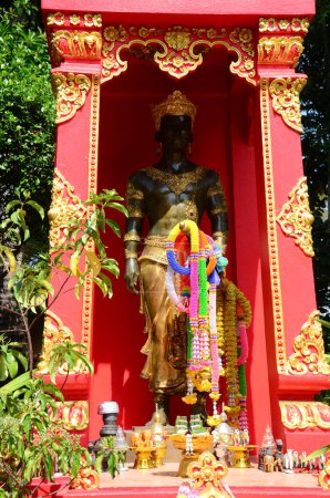Ancient Mangrai King of Lanna Kingdom statue or antique Mengrai King monument for thai people traveler travel visit respect blessing at Wat Phra Kaew or Pa Ya or Pa Yiea temple in Chiang Rai, Thailand