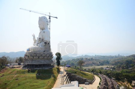 Renovate build big Quan Yin monument and sculpture carved Kuan Yin chinese goddess statue for thai people travelers travel visit in Wat Huay Pla Kang temple at Chiangrai city in Chiang Rai, Thailand
