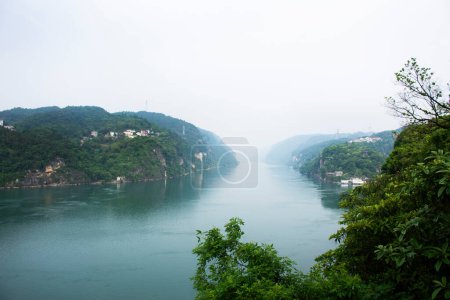 View landscape and range mountain of three gorges in yangtze river or Chang Jiang canal for chinese people travelers travel visit in Xiling gorge sanya cave viewpoint at Yichang city in Hubei, China