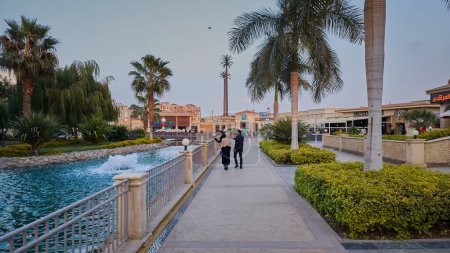 Photo for Cairo, Egypt- December 25 2023: South park Madinaty in Second new Cairo with plenty of delicious restaurants and dining options, beautiful forest lakes, and a theme park. - Royalty Free Image