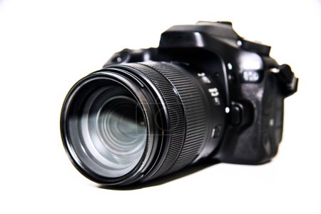 Digital SLR camera on a white background. Close-up.