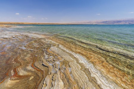 Mud and layers of salt on the coast of the Dead Sea in Israel