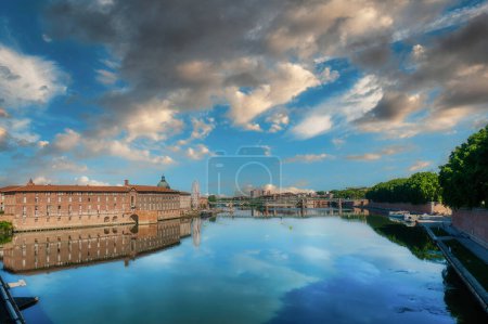 Toulouse is the capital of the Occitania region in southern France. It is divided by the Garonne River and is located near the border with Spain. It is known as La Ville Rose
