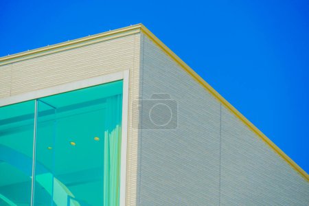 The corner of the building reflected in the blue sky. Shooting Location: Koto -ku, Tokyo