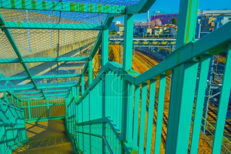 Blue stairs and city views. Shooting Location: Toshima -ku, Tokyo