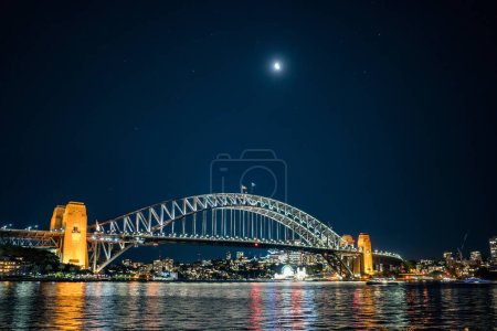 Photo for Harbor Bridge moonlit night. Shooting Location: Australia, Sydney - Royalty Free Image