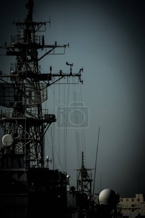 The silhouette of a warship floating in the night view. Shooting Location: Nishi -ku, Yokohama