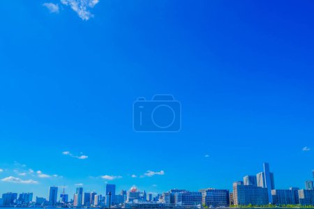 Blue sky and city lineup. Shooting Location: Koto -ku, Tokyo