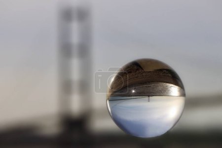 Photo for Humber Bridge in Hull, England, UK, seen through a crystal ball - Royalty Free Image