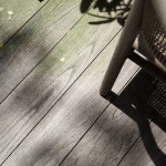 Wooden floor exterior gray brown outdoor with floral plant shadow minimal aesthetics shot design.