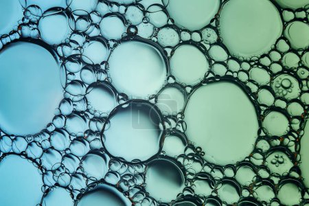Photo for Macrophoto of oil droplets and bubbles on a water surface - Royalty Free Image