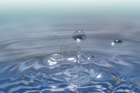 Photo for Clear aqua water droplet splashing in concentric circles, capturing refreshing purity. - Royalty Free Image