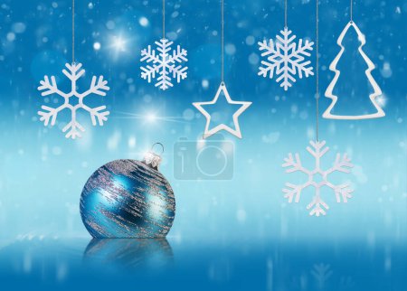 Photo for Abstract Christmas and New Year concept with christmas decorations, snow, snowflakes and stars on blue tender background - Royalty Free Image