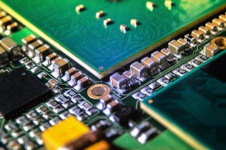 Photo for Modern electronic circuit board with processor, integrated circuits and surface mounted passive components close up. Technology background - Royalty Free Image