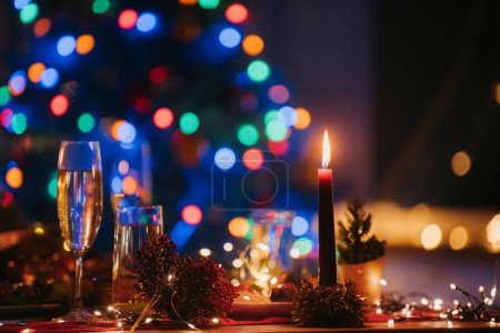 Photo for No people shot of decorated holiday table showcasing cozy atmosphere of Christmas and New Year Eve - Royalty Free Image