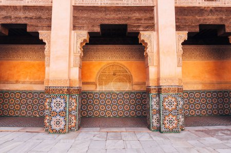 Photo for Pose of the traditional walls, marble floor and impressive columns of Ali ben Youssef Medersa palace - Royalty Free Image