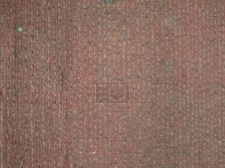 Foto de Textura de una alfombra roja tejida vieja - Imagen libre de derechos
