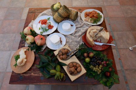 Photo for Cyprus traditional cheese and fruits on wooden table - Royalty Free Image
