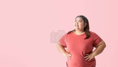 Téléchargez les photos : Fat woman thinking and looking, isolated on pink background. Clipping paths for design work empty free space - en image libre de droit