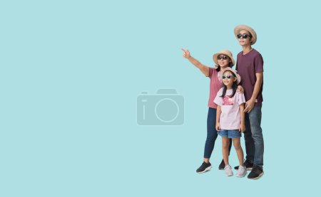 Photo for Happy asian family vacation, Father, mother and child, holiday travel concept, isolated on blue background. Clipping paths for design work empty free space - Royalty Free Image