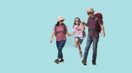 Photo for Family Travel Concept, Full body Happy asian family vacation, Father, mother and little daughter ready for vacation trip, isolated on pastel plain light blue background - Royalty Free Image