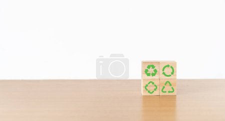 The concept of sustainability or environmental protection. wooden cube with sustainability, environment, green economy, renewable energy, recycle icon with white background.