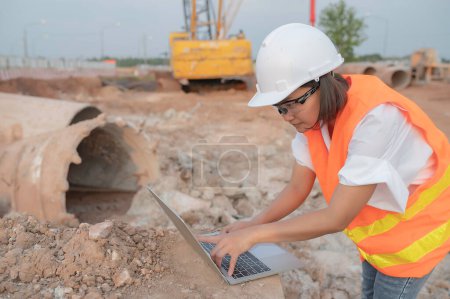 Photo for Civil engineers working at a construction site,The company manager supervises the road construction. - Royalty Free Image