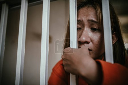 Photo for Hands of women desperate to catch the iron prison,prisoner concept,thailand people,Hope to be free,If the violate the law would be arrested and jailed. - Royalty Free Image