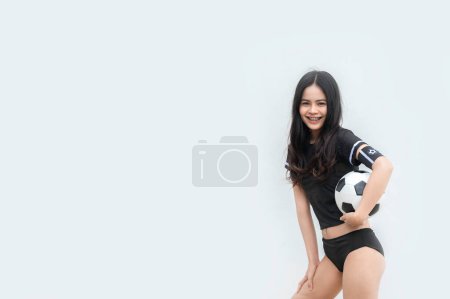 Téléchargez les photos : Young beautiful asian woman wear soccer player cheer sport,Female fans football cheering game - en image libre de droit