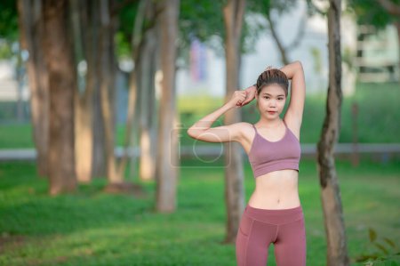 Photo for Asian beautiful slim woman at the park,Young girl love healthy exercise,Teen wear sportswear - Royalty Free Image