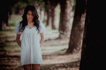 Photo for Asian beautiful girl feel alone in the forest,Sad woman concept,Thailand people,Lady sadness about love from boyfriend,She feeling broken heart - Royalty Free Image