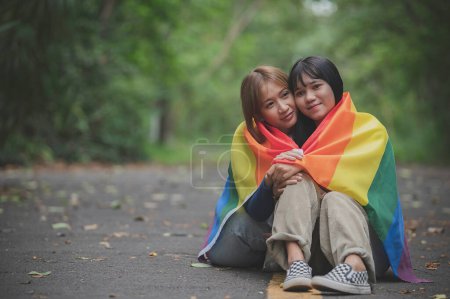 Photo for Couple of girl with girl,LGBT Pride month concept,Asian Handsome male make up and wear woman cloth,Gay Freedom Day,Portrait of Non-binary on white background - Royalty Free Image