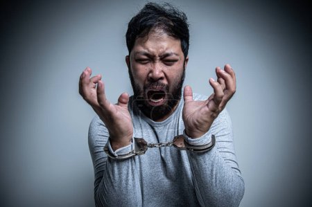 Photo for Asian handsome man angry on white background,Portrait of young Stress male concept,Bad mood after talking on the phone - Royalty Free Image