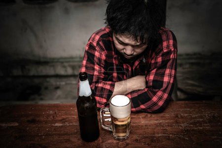 Photo for Asian man drink vodka alone at home on night time,Thailand people,Stress man drunk concept - Royalty Free Image