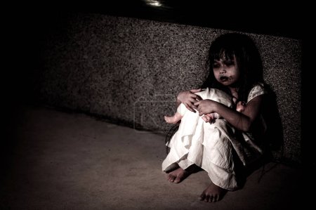 Photo for Sad child ghost at night,Halloween  Festival concept,Friday 13th,Horror movie scene,A girl with doll - Royalty Free Image