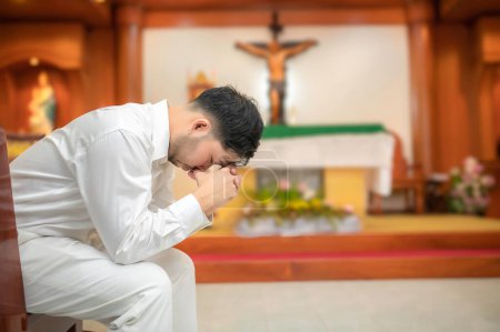 Photo for Christian man asking for blessings from God,Asian man praying to Jesus Christ - Royalty Free Image