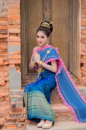 Photo for Portrait of asian woman wear ancient thai dress style,Thailand people Thai traditional dress pay respect - Royalty Free Image