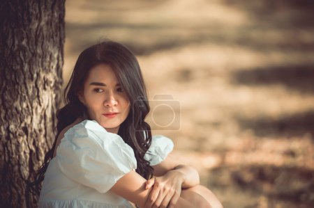 Photo for Lonely Sad fat woman ,She think over from love,heartbreak,Heartbroken because of disappointment,Thailand people - Royalty Free Image