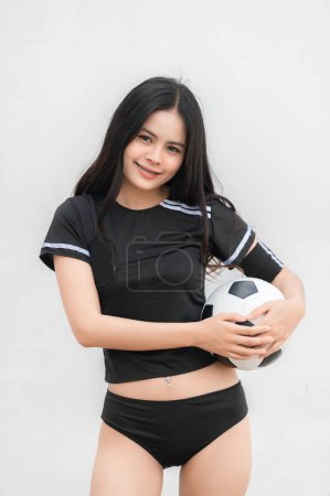 Photo for Young beautiful asian woman wear soccer player cheer sport,Female fans football cheering game - Royalty Free Image