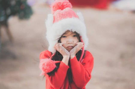 Foto de Portrait of little girl in christmas festival,Asian kid winter holiday - Imagen libre de derechos
