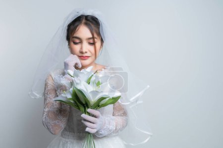 Photo for Portrait of asian woman wear bride with flower on white background,Wedding concept - Royalty Free Image
