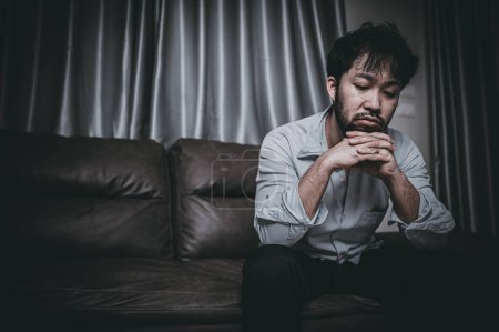 Photo for Asian handsome man stress from work overload,Tired male come back home after a lot of work from company,risk of depression - Royalty Free Image