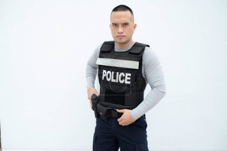 Photo for Portrait of police hold gun in hand on white background,Handsome asian cop - Royalty Free Image