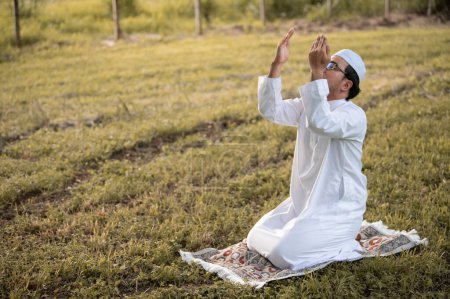 Photo for Asian islam man prayer,Young Muslim praying,Ramadan festival concept - Royalty Free Image