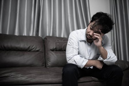 Téléchargez les photos : Asian handsome man stress from work overload,Tired male come back home after a lot of work from company,risk of depression - en image libre de droit