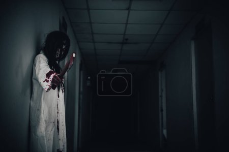 Photo for Portrait of asian woman make up ghost,Scary horror scene for background,Halloween festival concept,Ghost movies poster,angry spirit in the apartment - Royalty Free Image