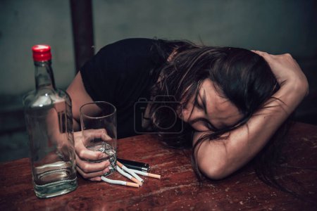 Photo for Asian woman drink vodka alone at home on night time,Thailand people,Stress woman drunk concept - Royalty Free Image